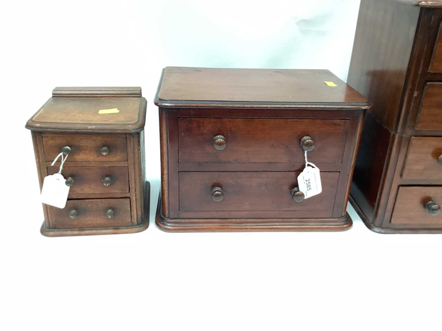 Three miniature mahogany chests of drawers and a miniature bureau - Image 2 of 8