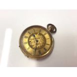Late 19th century Continental 14ct gold fob watch in engraved case, 3.4cm in diameter