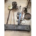 Sundry metalwares and other items, including a fender, Middle Eastern coffee pot, fireplace accessor