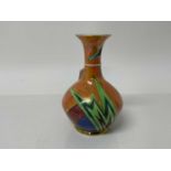 Carlton ware lustre vase with geometric decoration on orange ground, 16cm high