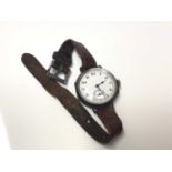 First World War period silver trench wrist watch with white enamel arabic numeral dial with subsidua