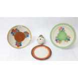 Three Clarice Cliff plates, together with a Celtic Harvest preserve pot (4)