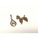 9ct gold novelty poodle brooch and gold (stamped 585) pendant set with a single cultured pearl