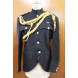 Large collection of assorted military uniform to include an RAF Great Coat, in a chest on wheels, to