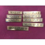 Collection of eight Rolls Royce and Bentley badges for models to include Silver Spur and Silver Spir