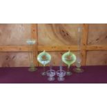 Pair Victorian Vaseline glass tuliphead vases, two vases with crinkle and waved tops and pair spill