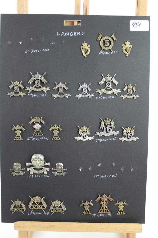 Five boards mounted with British military cap badges, Lancers, Hussars and Dragoons some reproductio - Image 5 of 14