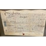 17th century glazed indenture framed together with another and a collection of unframed indentures