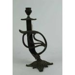 Interesting brass candlestick constructed from an Imperial German sword hilt, 28.5cm in overall heig