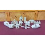 Twelve Crested ware military models including tanks, ships, motorcycle and side car, cannon etc