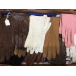 Vintage accessories including felt cloche hat, various leather and sheepskin gloves, fur collars, pa