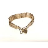 9ct gold gate bracelet with padlock clasp