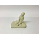 Rookwood pottery figure of a nude female, impressed marks to base, numbered 2858, 11cm high