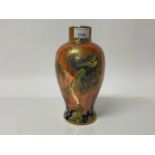 Carlton ware lustre vase decorated with bird and butterflies on orange ground, 24cm high