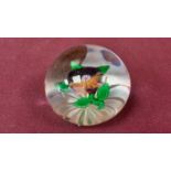 Baccarat glass paperweight with lampwork pansy and star cut base, 4.5cm diameter