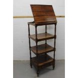 Regency rosewood four tier whatnot, with rising folio stand top