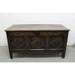 Late 17th century carved oak coffer with carved frieze and three carved panels