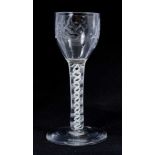 18th century wine glass with floral spray engraved bowl on double opaque twist stem on splayed foot