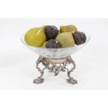 Victorian silver burner stand now with glass mount, together with stone carved models of fruit