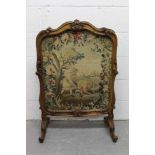 19th century French carved walnut fire screen, utilizing an 18th century tapestry fragment
