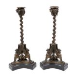 Pair of Grand tour bronze candlesticks