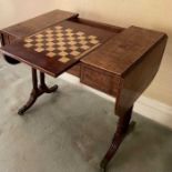 Regency style mahogany sofa / games table, the hinged rounded rectangular top with reversible top ha