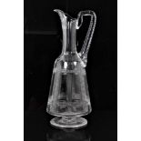 1870s aesthetic movement footed crystal claret jug with finely cut geometric decoration, the design