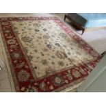 Ushak style carpet, with lotus flower design on cream ground in borders, 246 x 194cm