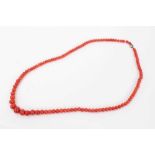 Antique coral bead necklace with a string of graduated coral beads measuring approximately 4mm to 9.