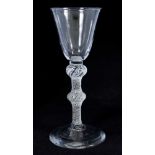 18th century wine glass with bell-shaped bowl, double knoped air twist stem on splayed foot 16 cm