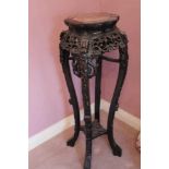 Late 19th century Chinese carved rosewood plant stand with rouge marble inlaid top, carved apple blo