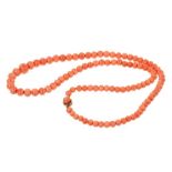 Antique coral bead necklace with a string of graduated coral beads