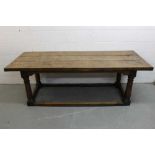 17th century style oak and fruitwood refectory dining table with plank top on turned legs joined by
