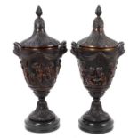 Pair of impressive lidded bronze urns in the manner of Clodion
