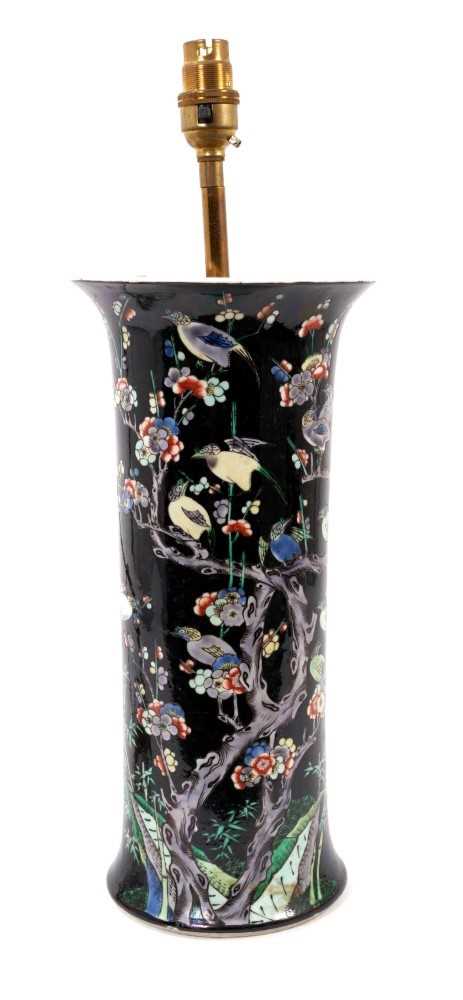 Late 19th century Chinese famille noire porcelain sleeve vase, painted with birds perched amongst pr