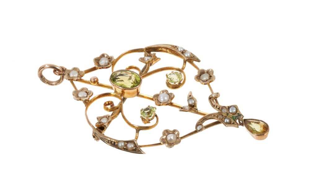 Edwardian peridot and seed pearl pendant brooch with openwork foliate scrolls, 54mm