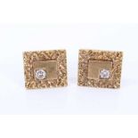 Pair of gold cufflinks with diamonds