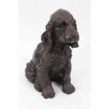 Bronzed composition figure of a puppy