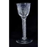 18th century wine glass with vine engraved bowl on air twist stem and splayed foot 14.4 cm