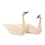 Follower of Guy Taplin, pair of carved wood swans
