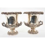 Pair of 19th century silver plate wine coolers of campagna form with engraved armorials.