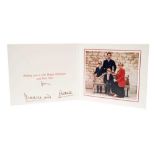T.R.H. The Prince and Princess of Wales, signed 1991 Christmas card with twin gilt Royal ciphers to
