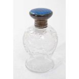 1920s silver amounted toilet water bottle with engraved decoration and blue enamelled cover
