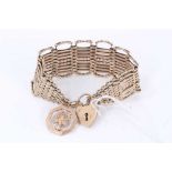 9ct gold gate bracelet with padlock clasp and gold fob