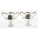 Pair of George III Irish silver twin handled cups by Matthew West, Dublin, circa 1780.