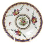 An unusual Worcester small saucer dish, painted with an exotic bird, circa 1775
