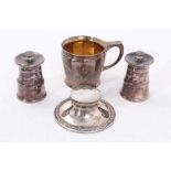 George V silver inkwell, together with a christening cup and a pair of 1960s silver pepper grinders