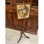 Regency mahogany polescreen with painted floral banner