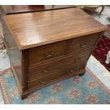 George III style mahogany chest of two short and two long drawers with reeded canted corners on brac