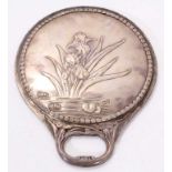 Late Victorian silver mounted hand mirror decorated with irises